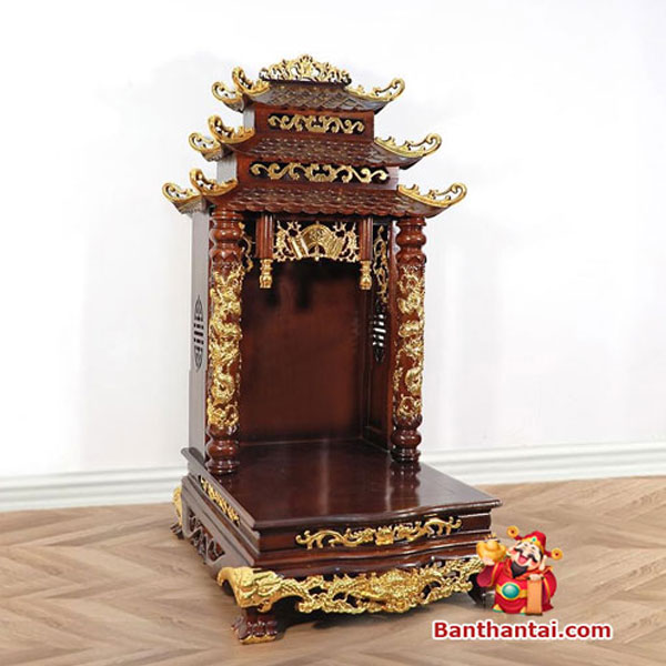 Mẫu bàn thờ này được thiết kế với họa tiết rồng phượng tinh xảo, dát vàng sang trọng Mẫu bàn thờ này được thiết kế với họa tiết rồng phượng tinh xảo, dát vàng sang trọng