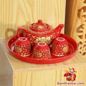 Bộ ấm chén trà gốm đỏ sen vàng